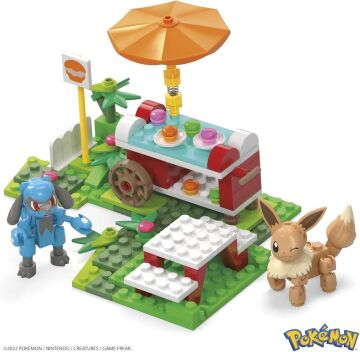 Mega Bloks Pokémon Adventure Builder Piknik yapı seti ile diğer dünyalara bağlanabilen 193 uyumlu yapı bloku ve parça, 7 yaş ve üzeri HDL80